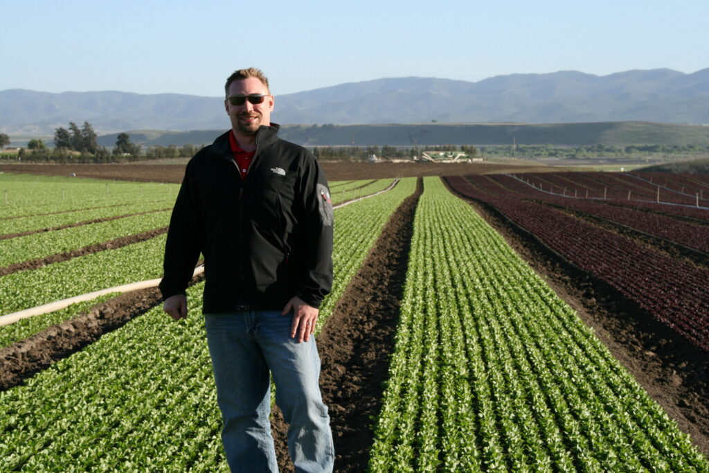 Michael Larose standing in a field